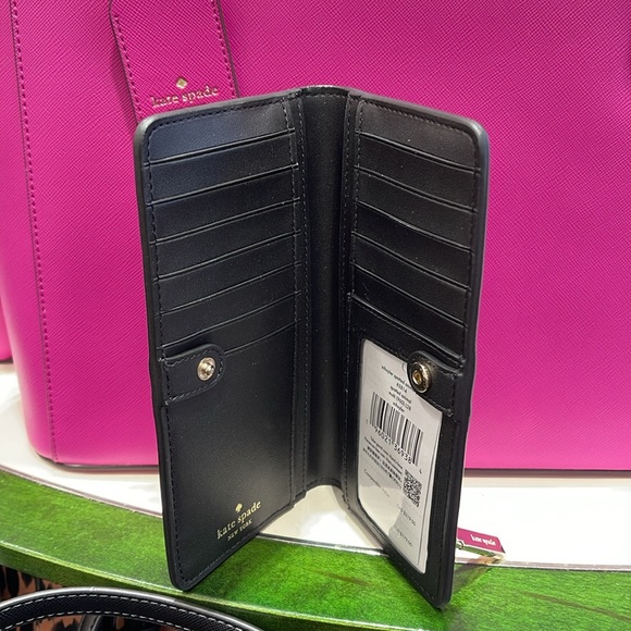 Kate Spade Schuyler Large Slim Bifold Wallet
COLOR:
Multi
NWT - Picture 9 of 16